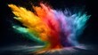 © irawan - Brilliant spectrum of finely ground pigment explodes upward against a deep dark background
