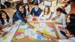 © Rawpixel.com - Diverse group of students collaborating around a table, sharing ideas and notes. Engaged in teamwork, brainstorming, and creative discussion in a classroom setting. Students working together in class.