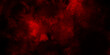 © TextureStock - A dark dramatic background with intense red and black smoke-like clouds, creating a fiery, atmospheric effect. red grange powder explosion cloud on black background. red scary horror movie background.
