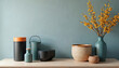 © miss irine - Still life photo featuring various storage containers vases and flowers on wooden table. Decorative items include wicker metal and ceramic objects. Home interior design focuses on modern aesthetics.