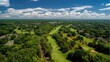 © Popelniushka - Aerial View of Lush Golf Course in Monroe, New Jersey: A Real Estate Gem Surrounded by Vibrant Greenery and Clear Skies