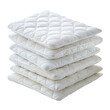 © ArzStudio - Quilted Mattress Components Stacked on a Soft Surface