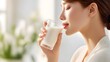 © pkproject - Serene woman sips from a glass of milk embodying wellness and natural hyd n in a bright peaceful setting