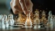 © TensorSpark - Hand moving a chess piece on a glass chessboard symbolizing strategic decision in digital strategy consulting.