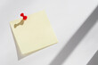 © Tetra Images - Blank post it note pinned to office whiteboard
