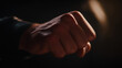 © Monthon - Clenched fist hand male hand skin knuckles low light dramatic lighting close up motion tension