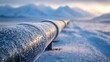 © Thanos - Frozen Pipeline in Snowy Landscape at Sunrise