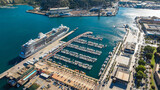 Aerial view of seaport in Cartagena, Spain. Cruise ships and small boats moored. Travel concept.