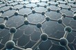 © IrenKa - Stylized 3D graphene sheet with carbon atoms in hexagonal lattice representing nanotechnology and advanced material science