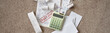 © Seventyfour - Hands holding invoices and bills with calculator on carpet, reviewing receipts and documents including past due notice, managing personal finances and expenses