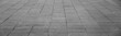 © Maxim Chuev - empty stone floor top in perspective. grey tile floor background in perspective view. line. empty copy space stone street. pavement. Granite outdoor tiled floor. gray granite. Marble texture