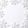 © WutStock02 - Delicate snowflakes gently rest on a pristine white background, showcasing intricate patterns and unique shapes, creating a serene winter atmosphere.