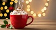 © soem - A red mug filled with hot cocoa and marshmallows on a wooden table with a festive background.