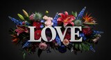 The word love spelled out with a beautiful arrangement of flowers