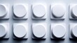 © STK - Abstract minimalist grid of white buttons with circular textured tops on a light grey background with studio lighting.