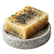 © Popy - Natural soap bar with visible herbs placed in a white speckled ceramic dish on transparent background.