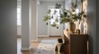 © Alana Dream - Warm Scandinavian hallway decorated with simple pine branches, neutral tones, handmade ornaments, and clean architectural lines illuminated by soft winter daylight
