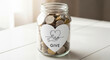 © Cozy Art - Clear jar filled with coins labeled 'Give' on wooden table