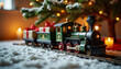 ©  VladaToday - Festive model train with gifts under christmas tree surrounded by snow and lit candles indoors