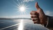 © Nice Seven - A hand gives a thumbs up against a backdrop of solar panels and a bright sun, symbolizing positivity and renewable energy.