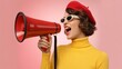 © Nasira - Retro Fashion Woman in Yellow Turtleneck and Red Beret Shouting into a Red Megaphone for Promotion