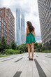 © Andrey_Arkusha - Young beautiful brunette woman in a green polka dot dress