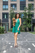 © Andrey_Arkusha - Lady with puppy dog. Young beautiful woman walks with her poodle dog