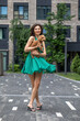© Andrey_Arkusha - Lady with puppy dog. Young beautiful woman walks with her poodle dog