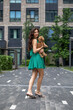 © Andrey_Arkusha - Lady with puppy dog. Young beautiful woman walks with her poodle dog