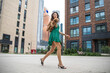 © Andrey_Arkusha - Lady with puppy dog. Young beautiful woman walks with her poodle dog