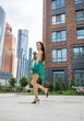 © Andrey_Arkusha - Lady with puppy dog. Young beautiful woman walks with her poodle dog