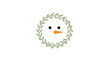 © Tatyana - Snowman face decorated with greenery and a carrot nose for Christmas