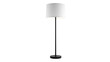 © Vibudhaart - A sleek modern floor lamp with a white fabric cylindrical shade, dark slender pole, and round base, emitting soft light. background removed