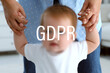 © New Africa - GDPR - General Data Protection Regulation. Mother with her little child at home, closeup. Privacy security