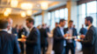 © Mark Lancer - Blurred Business People Networking at Corporate Event with Bokeh
