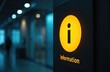 © Viktor - Illuminated information sign indoors. Bright yellow glowing info symbol on dark wall. Directional signage in modern building provides guidance to people. Useful service available.