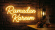 © Hamid - A realistic photography style image of a neon sign glowing on a rustic brick wall that says 'Ramadan Kareem' in cursive script.