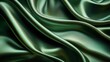 © Jdgkxbnc - luxurious green satin fabric draped in smooth flowing folds with glossy highlights and soft shadows, elegant and tranquil
