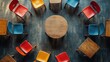 © istia - A top-down view of a circular table with chairs arranged around it, showing a wooden floor and colorful chairs.