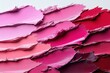 © letter - creamy layered swatches of pink and red cosmetic pigment with textured knife strokes on white, evoking bold, romantic and vibrant energy