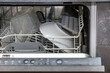 © vectorass - clean dishes in dishwasher