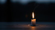 © Xenia - Evocative Suicide Loss Day tribute with burning candle emitting smoke in dark ambiance. Suicide Loss Day reminds about sensitivity to tragedy and mourning.
