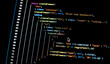 © themiex - Real-time generated written computer source code in closeup shot on monitor - white letters running on black background - concept of digitization, science, research and course of a program script