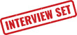 © MoshClusive - Red rubber stamp indicating an interview has been scheduled for a job applicant