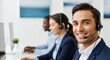 © ANDREY PROFOTO - Smiling male call center agent with headset providing customer support