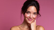 © Nattapol - Happy young latina woman portrait with radiant skin and natural beauty makeup. beautiful face with gentle smile against pink background