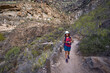 © Xalanx - Woman photographer on canyon trail