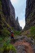 © Xalanx - Hiker in dramatic narrow canyon