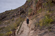 © Xalanx - Hiker ascending canyon trail Tenerife
