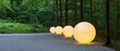 © AIPhoto - Glowing spherical outdoor lights on gravel pathway in lush green forest at dusk, serene ambient scene
